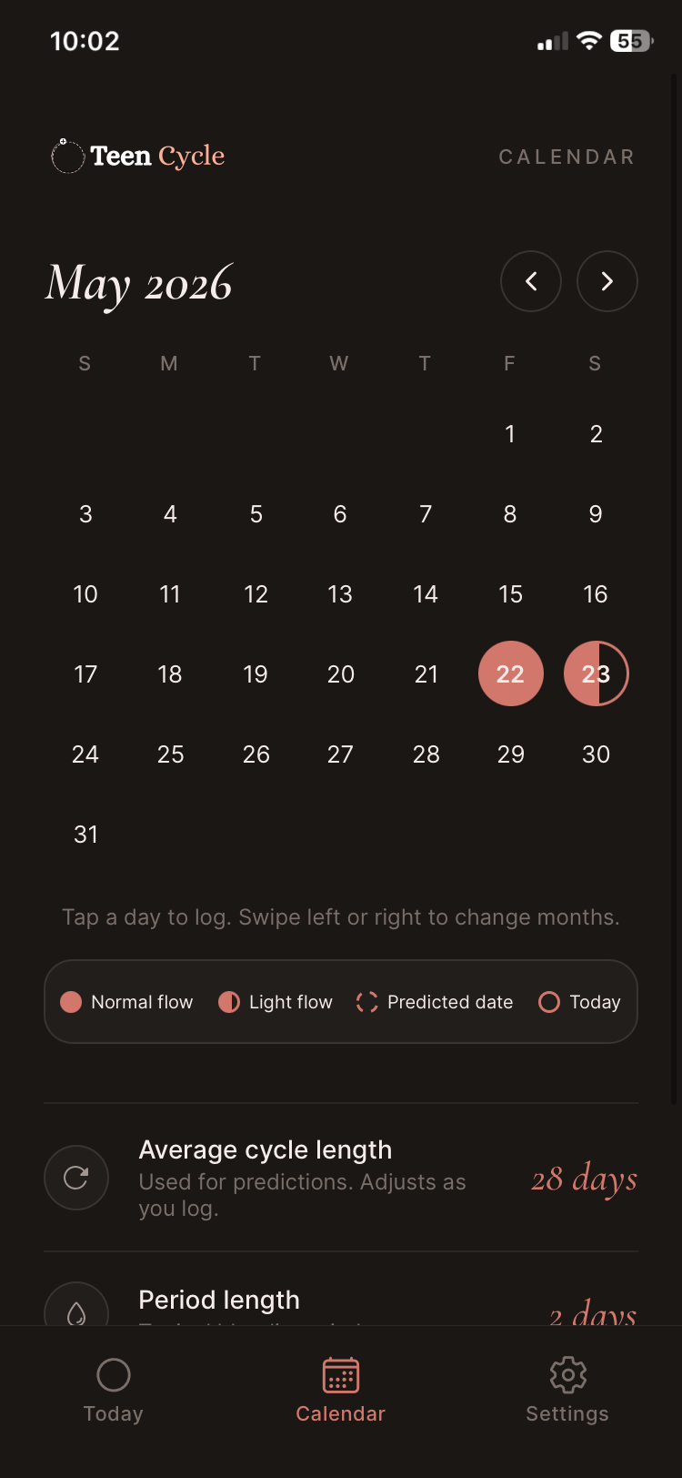 Calendar screen in dark mode with logged period days